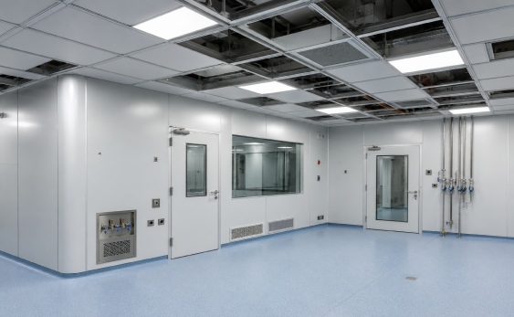 Cleanroom ceiling grid and modular clean room panels integrated with HVAC airlock and pass box systems for pharmacy cleanroom selection planning